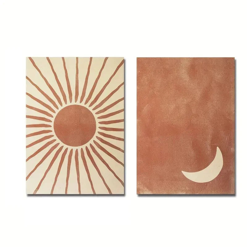 Two wall art pieces with sun and moon designs on a white background