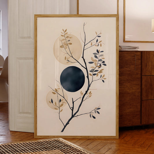Framed abstract art with branches and circles in a room setting