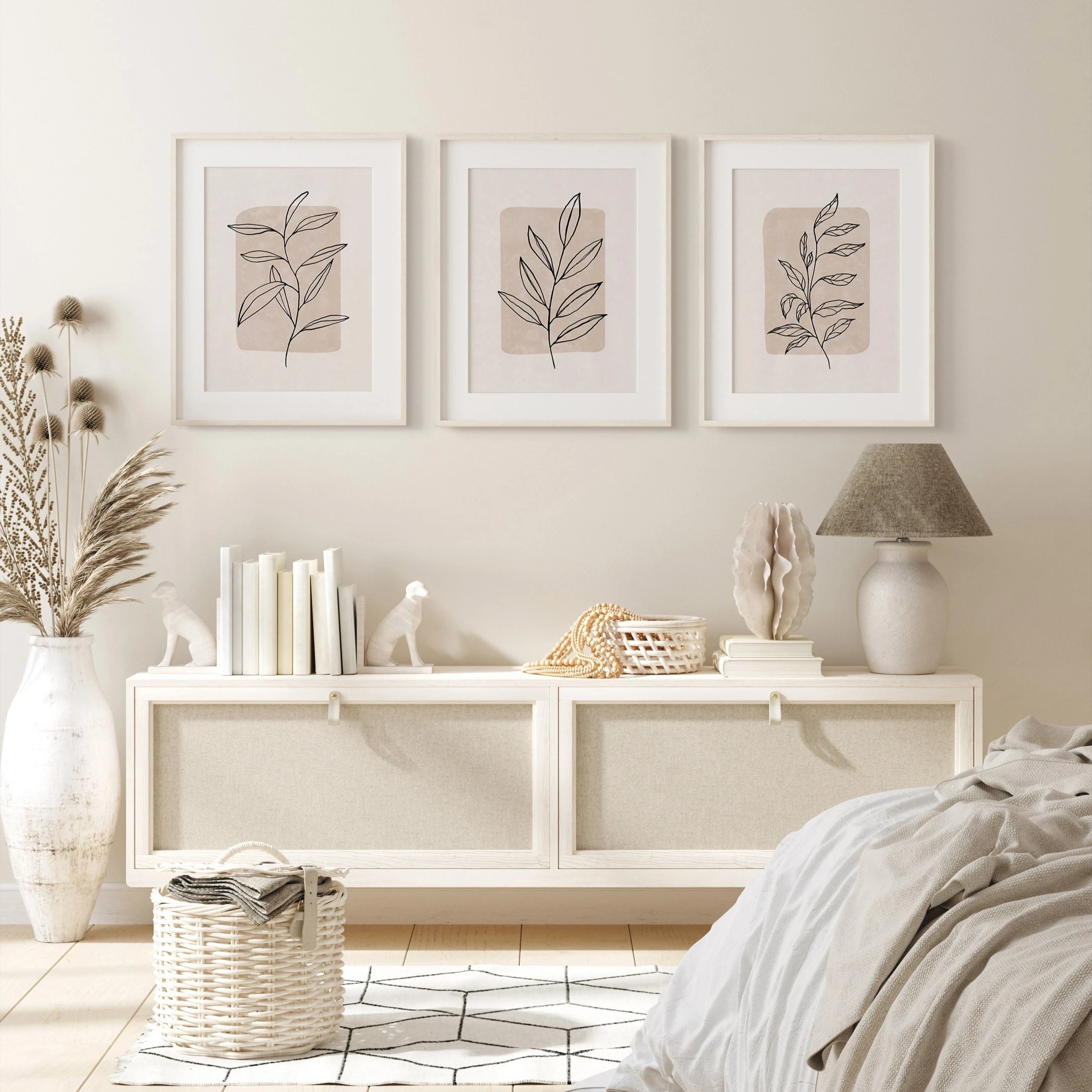 Neatly arranged living room with a white console table, decorative items, and wall art.