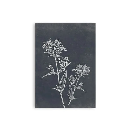Black slate tile with white floral design on a white background