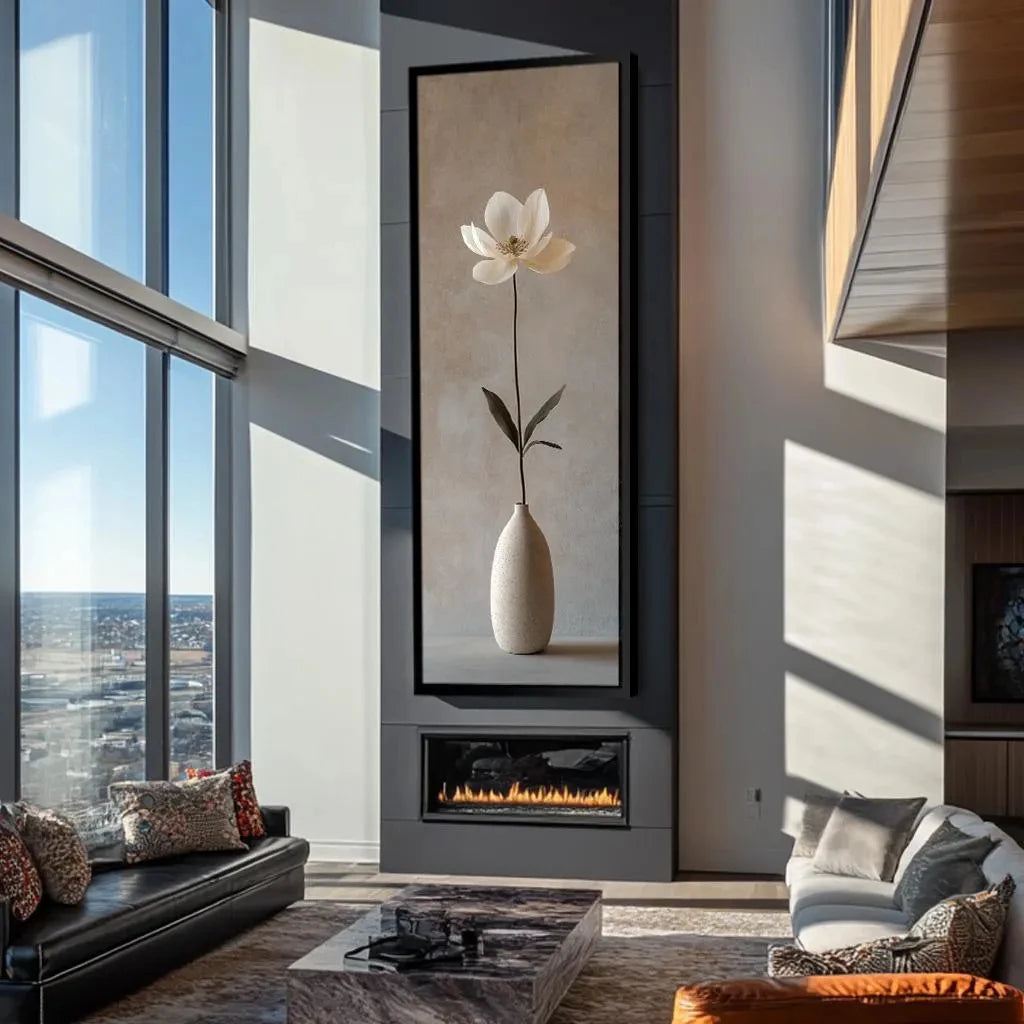 Modern living room with a large window, fireplace, and decorative wall art.
