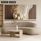 Beige sofa in a living room with a decorative wall piece and coffee table.