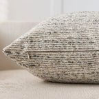 Textured pillow on a neutral background
