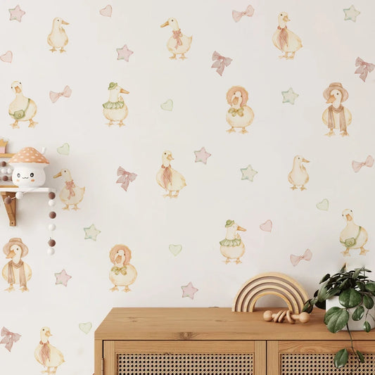 Children's room with wallpaper featuring cartoon animals and a wooden cabinet.