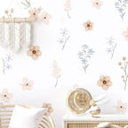 Decorative wall with floral patterns and a decorative light fixture.
