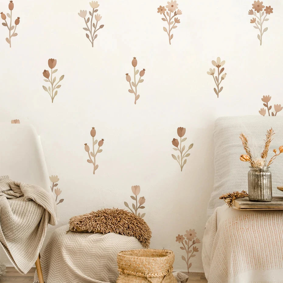 Decorative wall stickers with floral patterns on a neutral-colored wall.