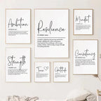 Set of motivational wall art prints on a white wall.