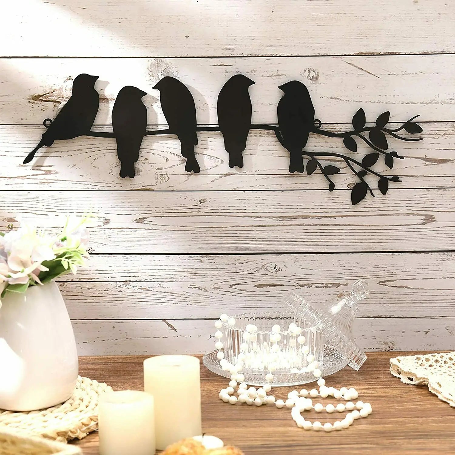 This Birds Silhouette Metal Wall Art 3D features iron-crafted birds on a branch, making it a beautiful and unique wall decoration for any room. Its 3D design adds depth and dimension to your living room, conservatory, children's playroom, porch, or patio. Elevate your space with this one-of-a-kind art decor.
