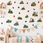 Children's room with toy tractor wall decals and a teddy bear on a bed.