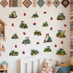 Wall with various toy tractor and truck stickers in a child's room.