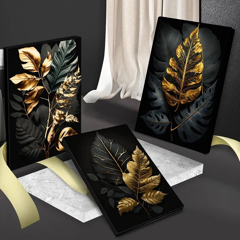 Three decorative panels with gold and black leaf designs on a dark surface.