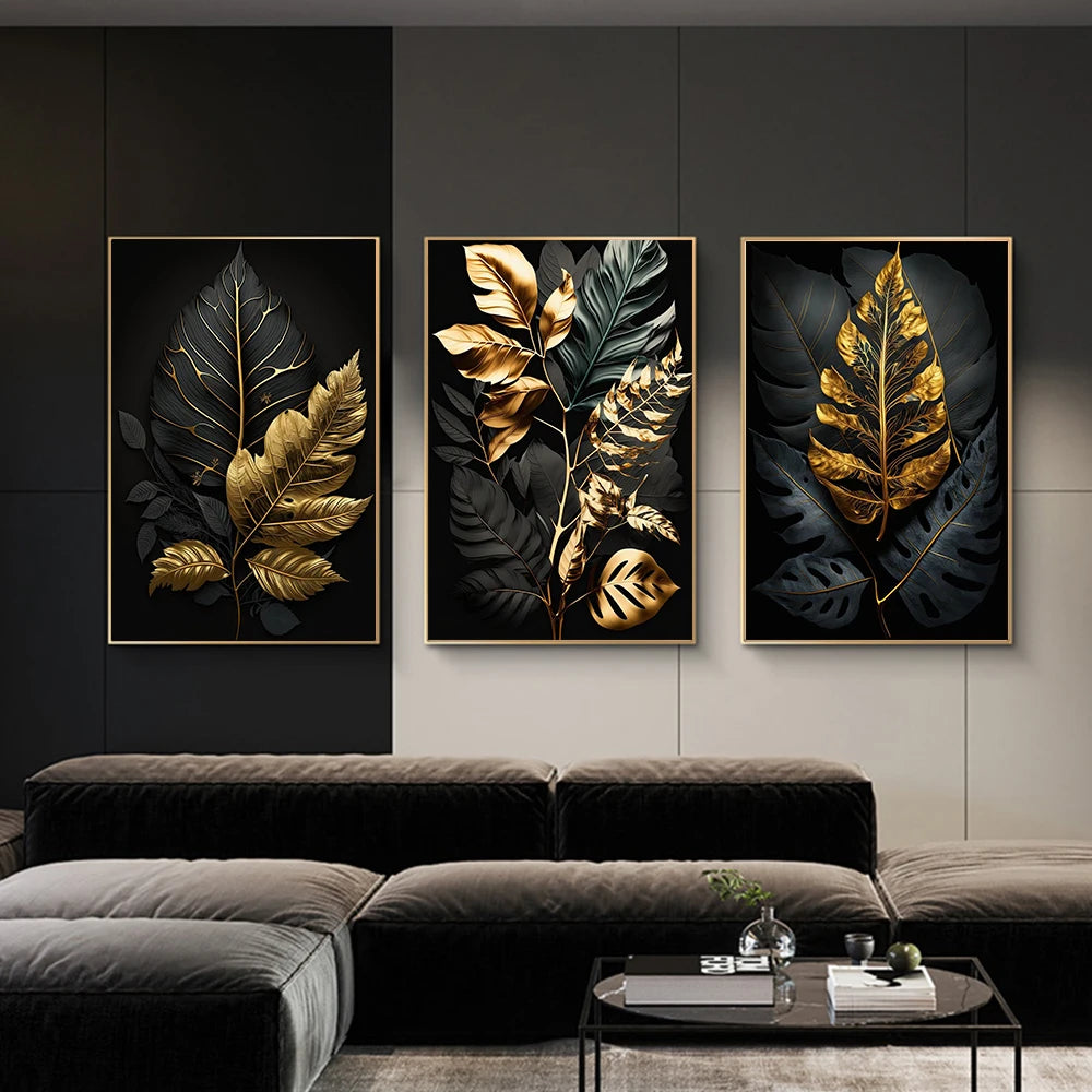 Three framed leaf artworks on a wall above a sofa