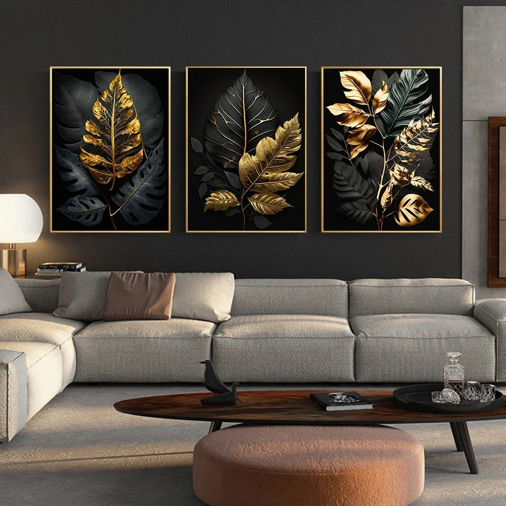 Living room with a gray sofa, wooden coffee table, and three framed leaf art pieces on the wall.