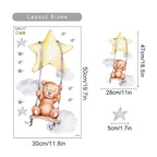 Wall decal of a teddy bear on a star swing with measurements