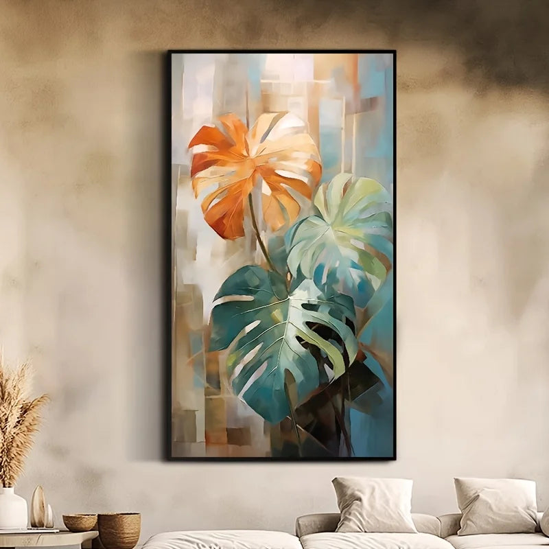 Abstract painting of tropical leaves in a living room setting