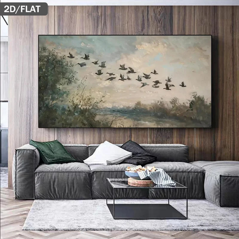 A large vintage landscape painting of a flock of birds flying over a marshy field is displayed on a dark wood wall above a modern gray sectional sofa in a living room setting.