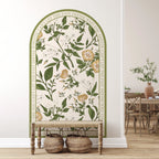 Floral wall mural with text in a room with a wooden table and chairs.