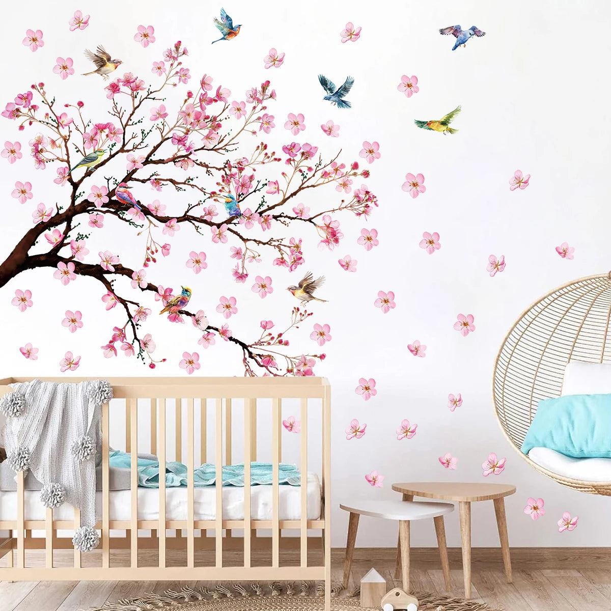 Cherry blossom wall decal with birds in a nursery setting