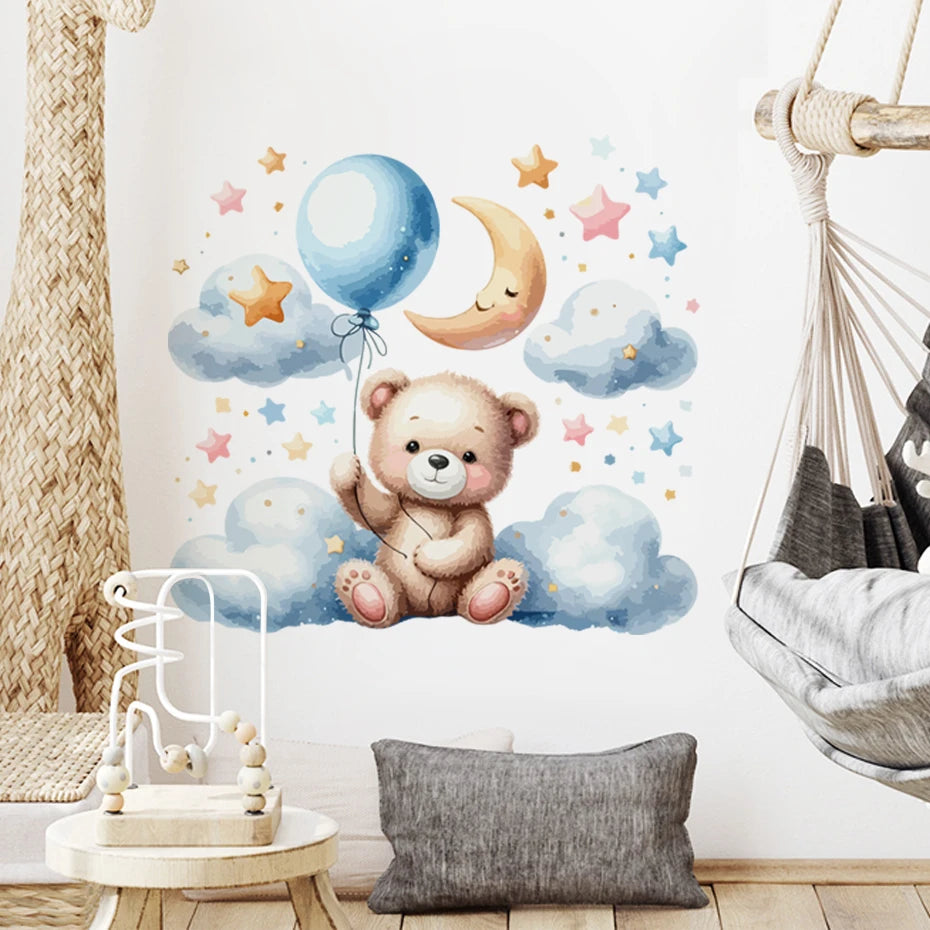Children's room with a teddy bear wall decal, balloon, and cloud design.