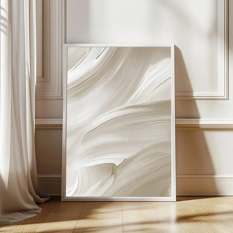 Framed abstract artwork on a wall with soft lighting