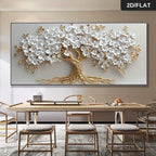 Decorative wall art of a tree with white flowers and gold branches in a modern dining room.