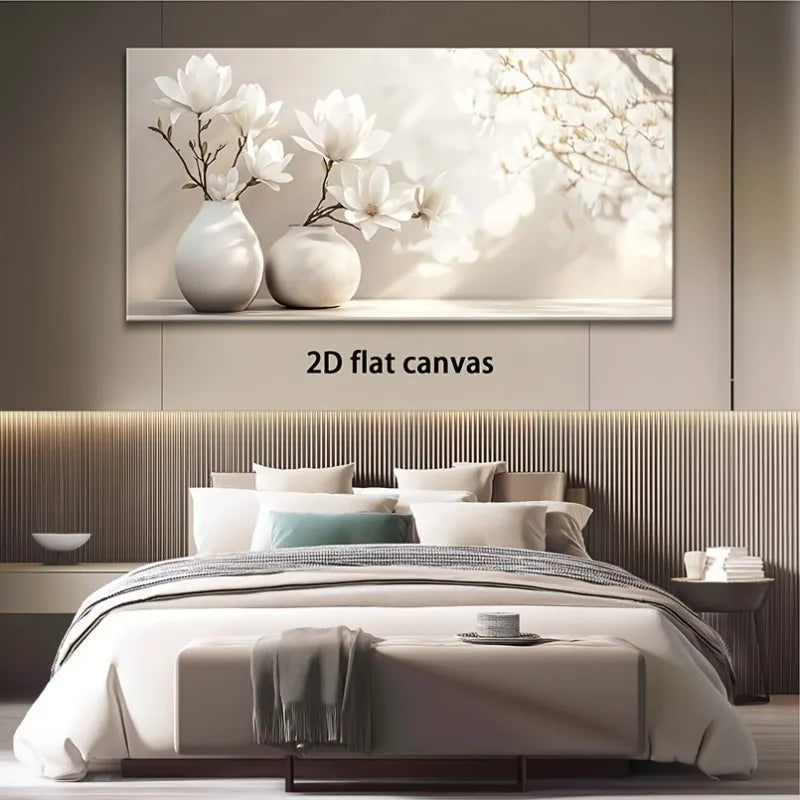 A large rectangular wall art canvas showing white flowers in two vases against a soft light background, displayed above a neatly made bed in a modern bedroom. The text '2D flat canvas' appears below the artwork.