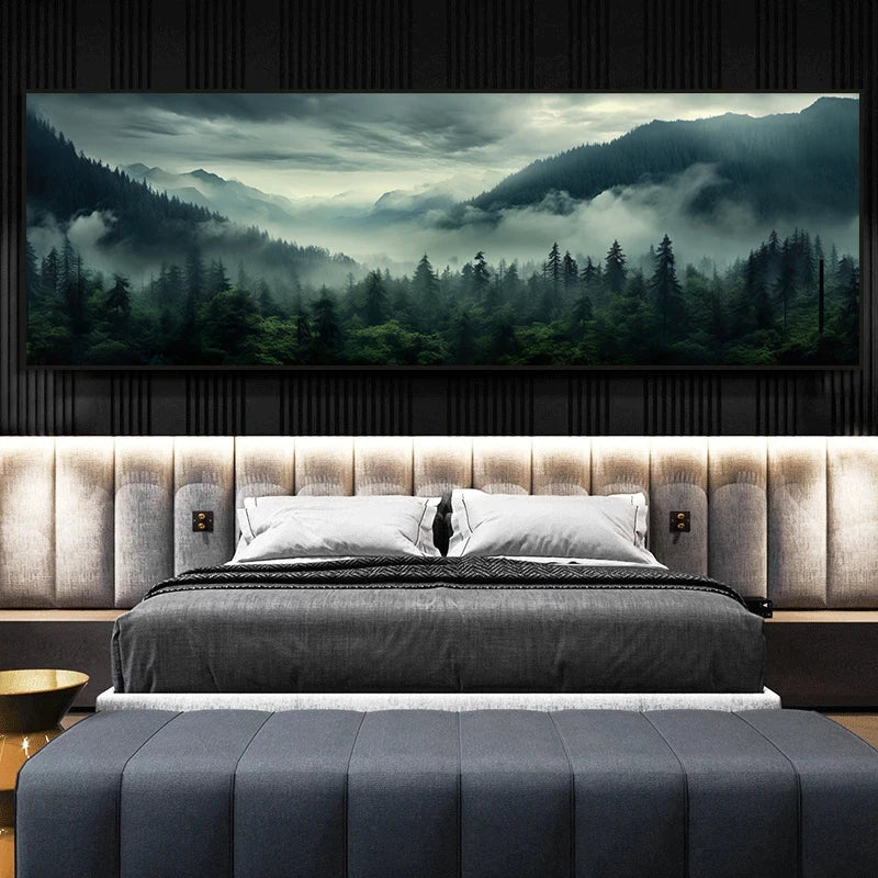 Modern bedroom with a large bed and a scenic wall art of mountains and trees.