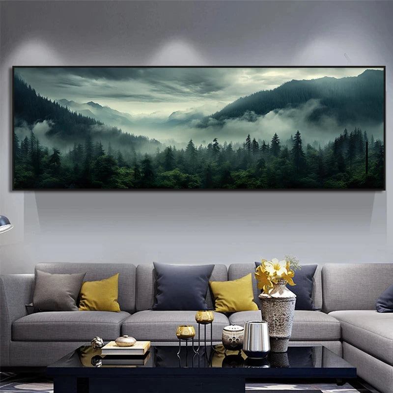 Living room with a large framed landscape of a forest and mountains on the wall.
