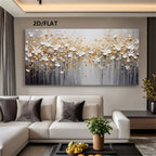 A large rectangular abstract wall art piece with white and gold 3D floral forms over a gray gradient background, displayed above a white sectional sofa in a modern living room. 